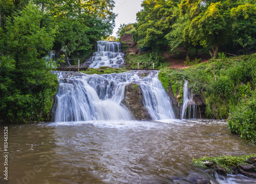 Dzhurynskyi waterfall in landscape park near Nyrkiv village in Ukraine