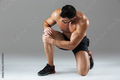 Portrait of a strong muscular male bodybuilder