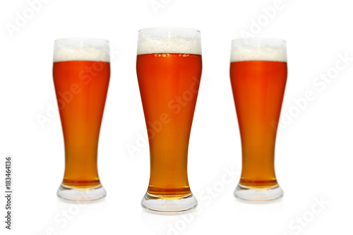 glass of light beer isolated on white background