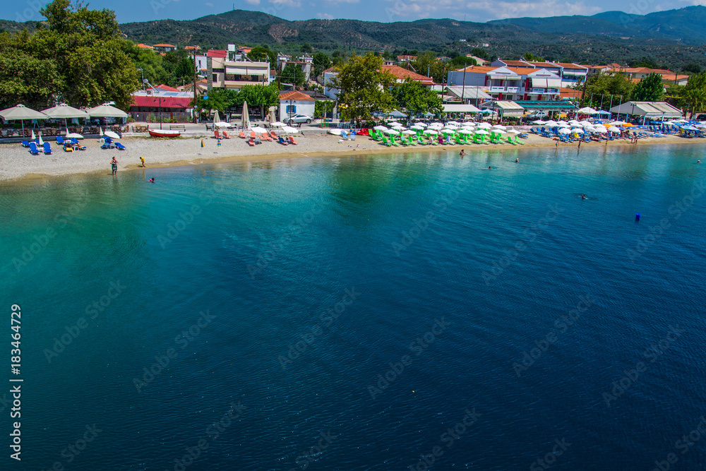 Pefki, Evia island, Greece July 25, 2014: The coast where the ferry is located at Pefki town in Evia island.