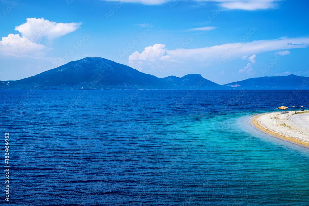 Fototapeta premium Pefki, Evia island, Greece July 25, 2014: The coast where the ferry is located at Pefki town in Evia island.