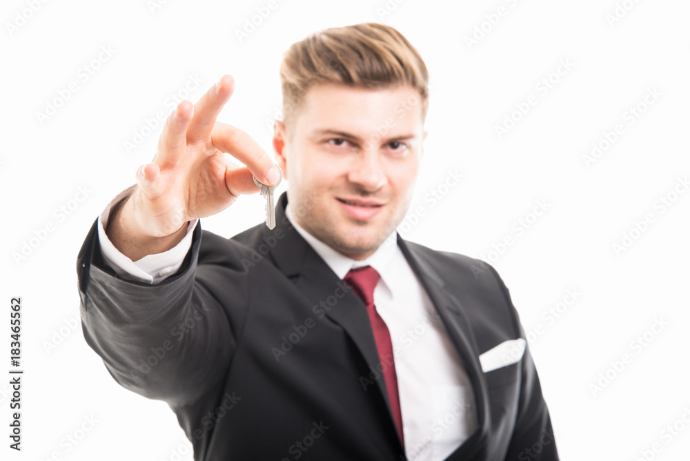 Selective focus of real estate manager holding key Selective focus of real estate manager holding key