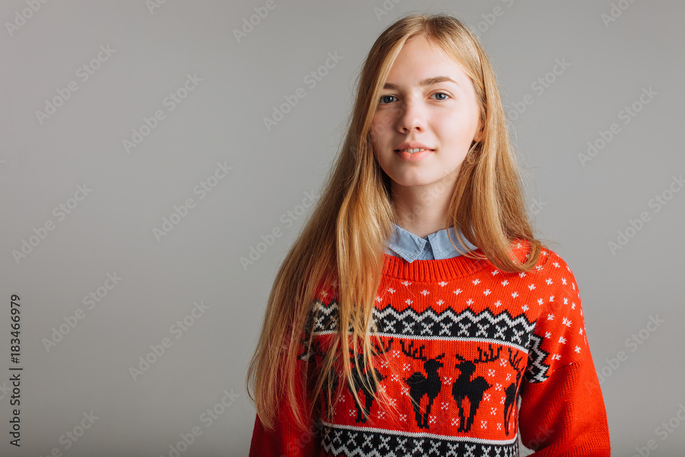 Girl in a Christmas sweater. Holiday Christmas. Christmas sweater Girl in a Christmas sweater. Holiday Christmas. Christmas sweater