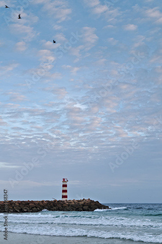 Light tower in Ilha Deserta (Desert Island). Faro, Portugal