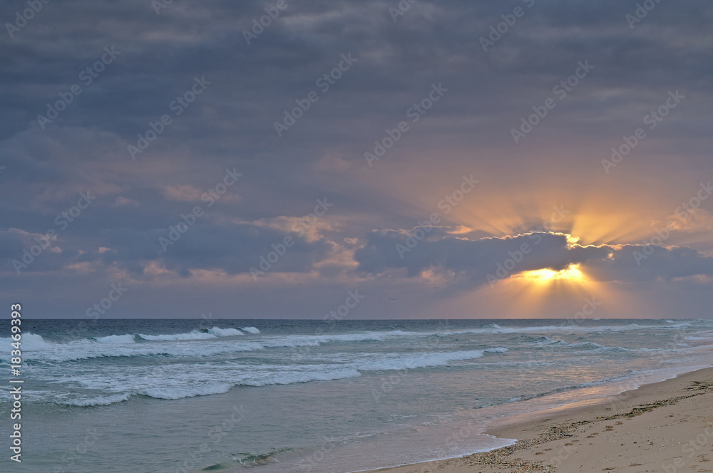 Sun and Clouds in Ilha Deserta. Algarve
