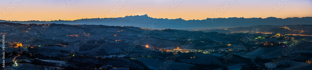 Obraz premium Wide angle panoramic view of Langhe Region in winter during blue hour, italy