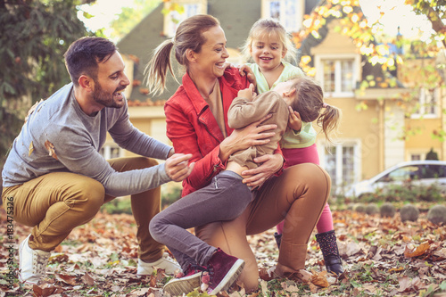 Tickling with family is fun.