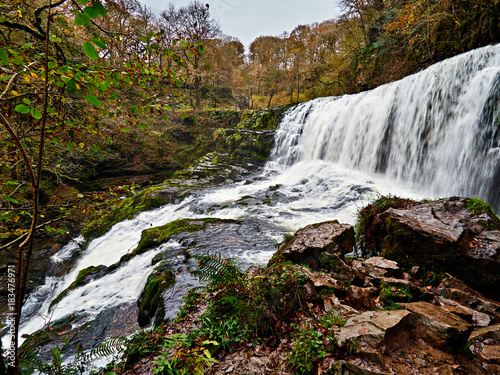 Sgwd Isaf Clun-gwynor or Lower Fall of the White Meadow is one of the four main waterfalls on the Afon or River Mellte in the Waterfall Country area of the Brecon Beacons National Park.