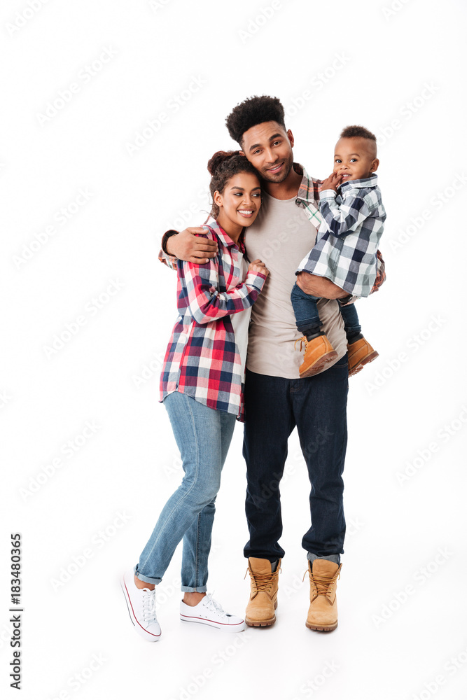 Full length portrait of a cheerful young african family Full length portrait of a cheerful young african family
