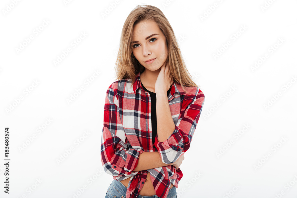 Portrait of a young pretty girl in plaid shirt Portrait of a young pretty girl in plaid shirt