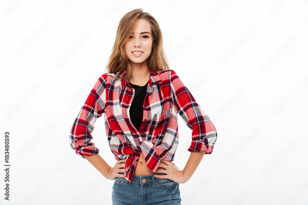 Portrait of a smiling casual girl in plaid shirt Portrait of a smiling casual girl in plaid shirt