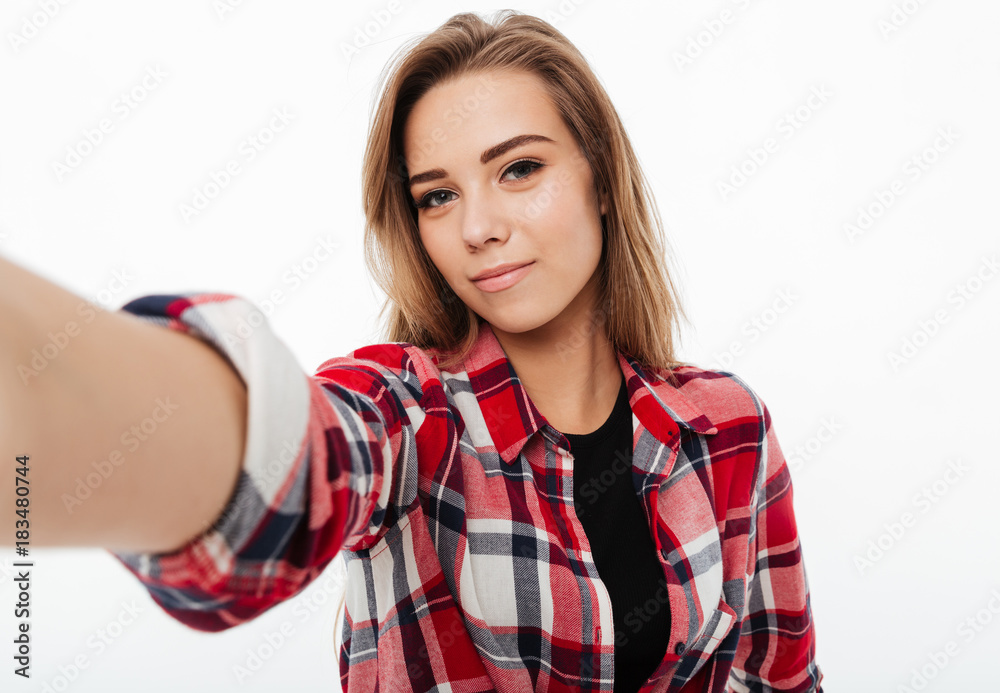 Portrait of a pretty lovely girl in plaid shirt Portrait of a pretty lovely girl in plaid shirt