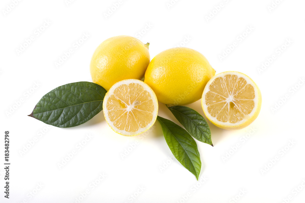 Lemons with leaves on a white background. Fresh lemons on a white background. Lemons with leaves on a white background. Fresh lemons on a white background.