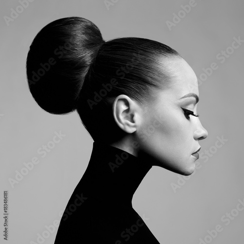 Beautiful elegant woman in black turtleneck photo