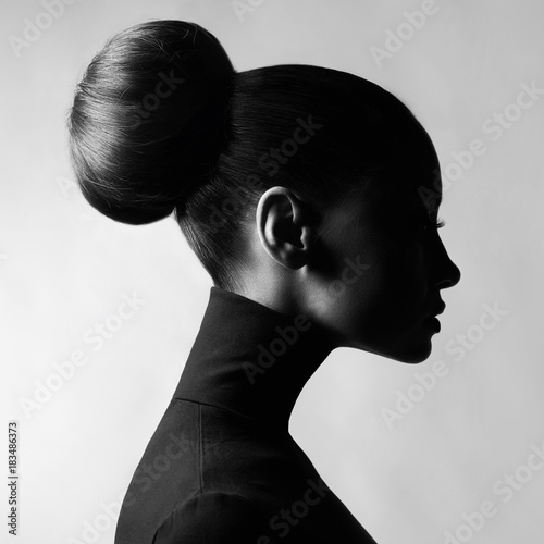Beautiful elegant woman in black turtleneck