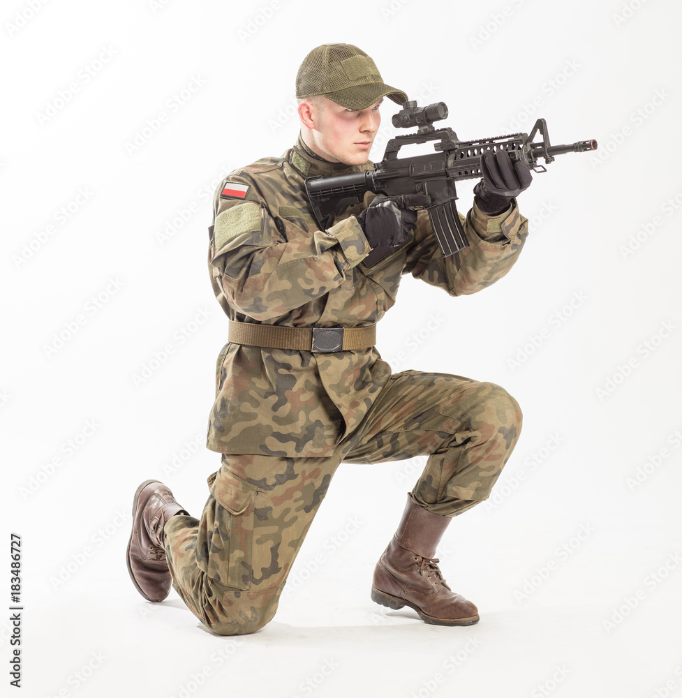 man in soldier's suit on white background. man in soldier's suit on white background.