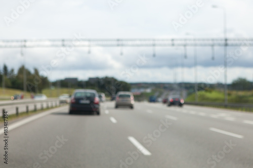 Driving a car on the highway in good weather conditions