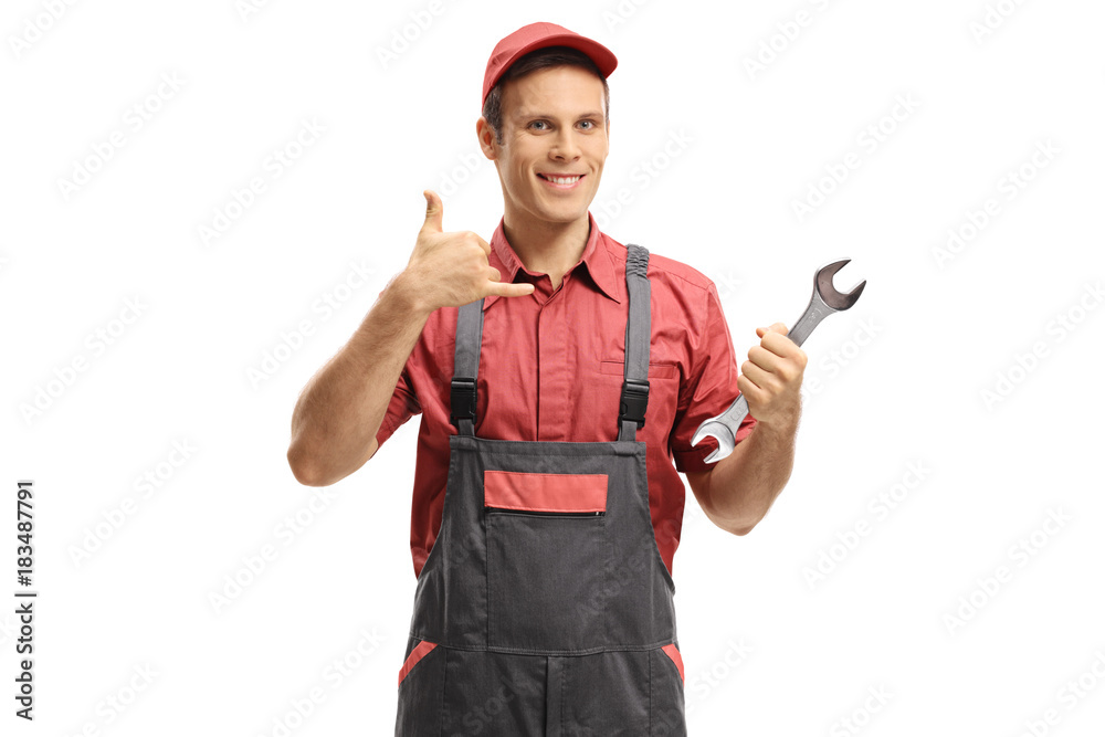 Repairman with a wrench making a call me gesture