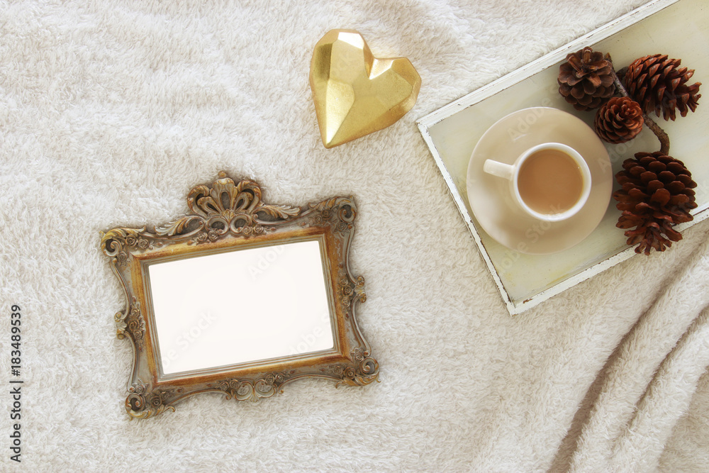 Empty wooden photo frame over cozy and warm fur carpet. For photography montage. Top view. Empty wooden photo frame over cozy and warm fur carpet. For photography montage. Top view.