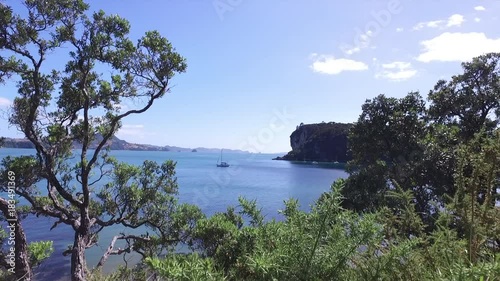 Yacht floating on the ocean in Cooks Beach New Zealand