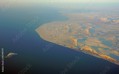 Aerial view of Sledge Island in the Bering Sea off the Seward Peninsula in Alaska photo