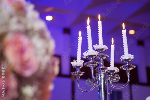 candlesticks with candles in ballroom