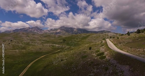 Aerial, green mountains in summer in Italy, 4K