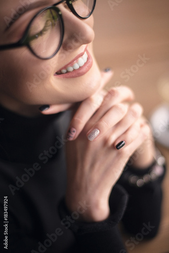 success business woman in glasses in cafe