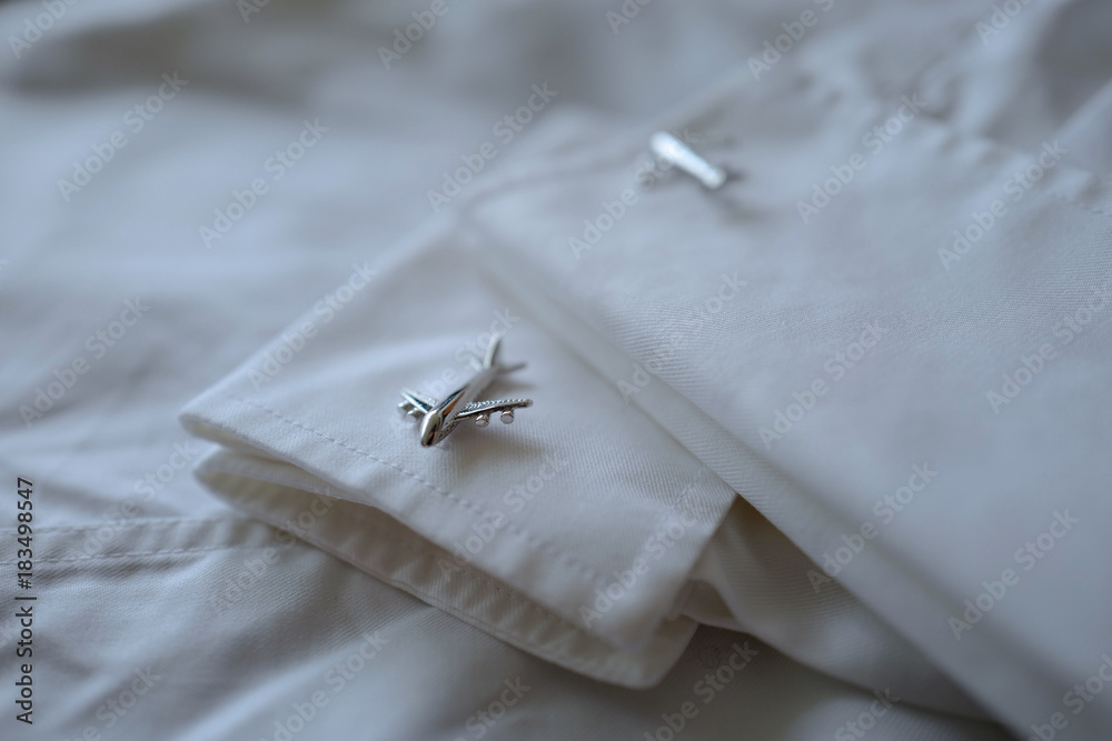 Obraz premium bouton de manchette avion