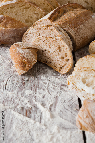 Bread background closeup on wooden table