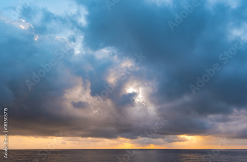 Dramatic cloudy Sky over Sea, morning sky and water, sunrise above ocean