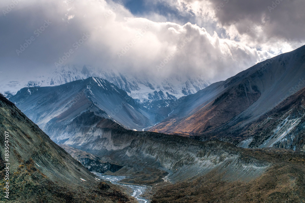 Path to the Tilicho lake, up to the Himalayas in the clouds