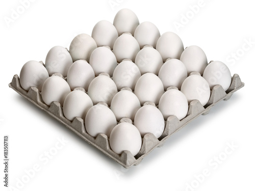 White and brown eggs in cardboard packing