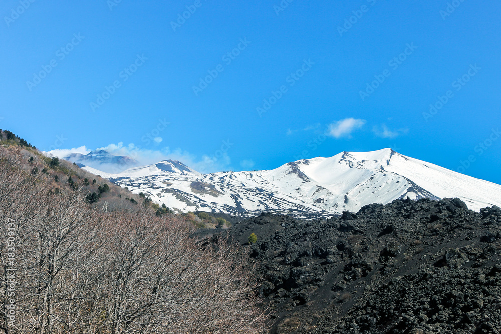 Snow on mount etna with blue sky