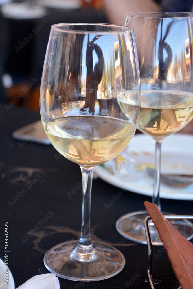 Celebration with two glasses of white wine. Celebration with two glasses of white wine.