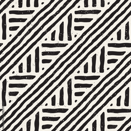 Hand drawn style ethnic seamless pattern. Abstract geometric tiling background in black and white.