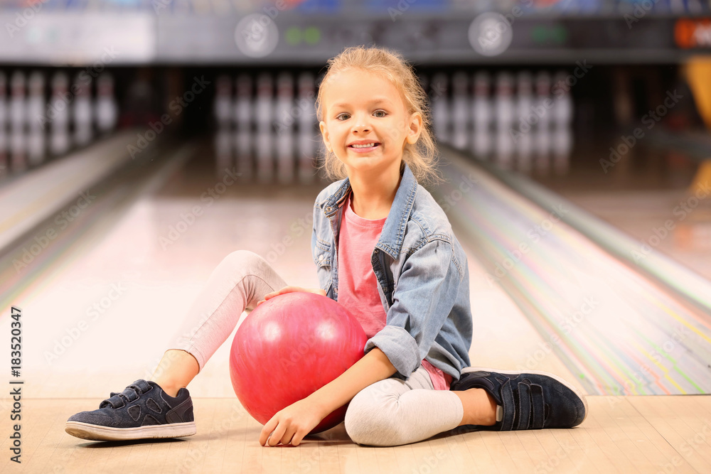 Cute little girl at bowling club Stock Photo Adobe Stock