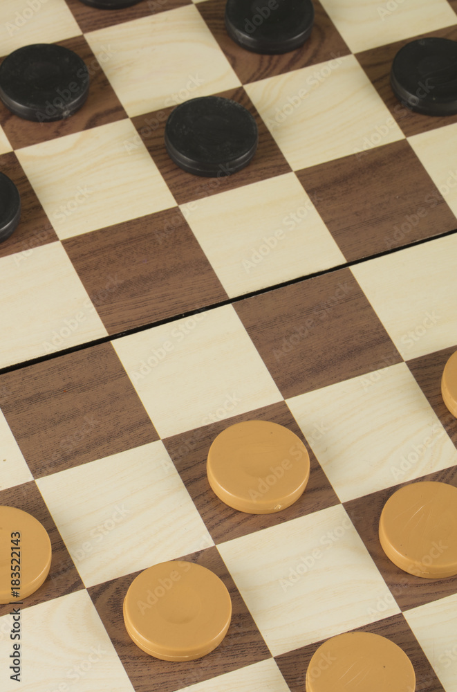 checkerboard with checkers game concept checkerboard with checkers game concept