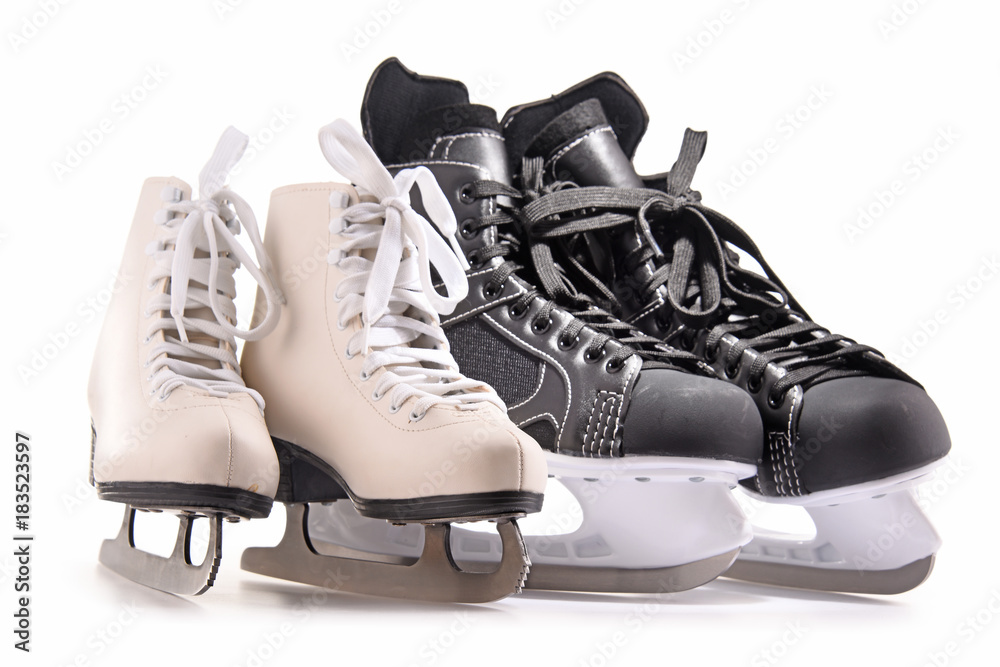 Ice hockey skates and figure skates isolated on white Stock Photo