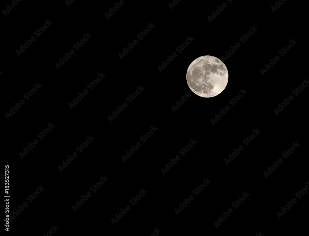 big full moon very bright in the black sky big full moon very bright in the black sky