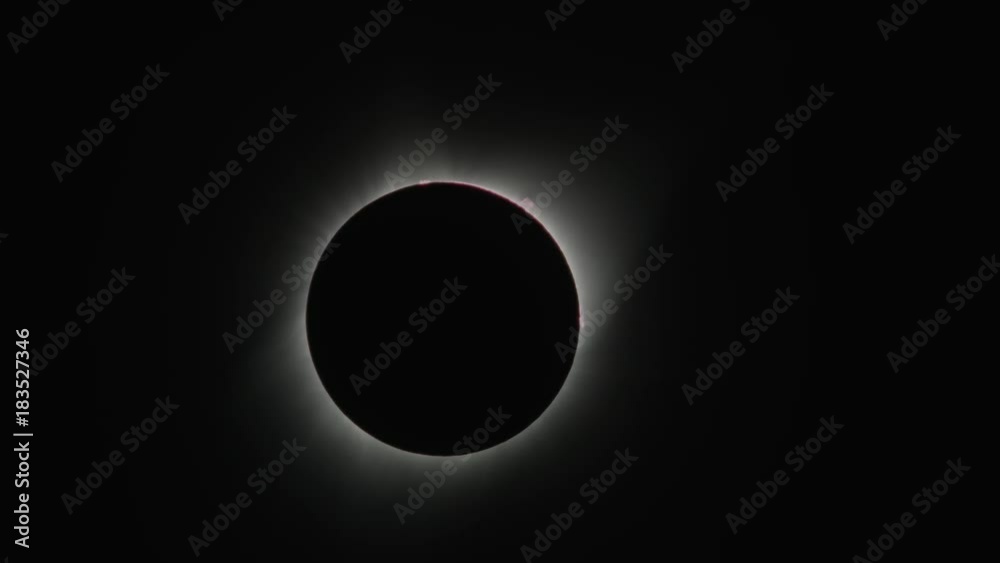 Total solar eclipse changing to reveal lens flare / Driggs, Idaho, United States