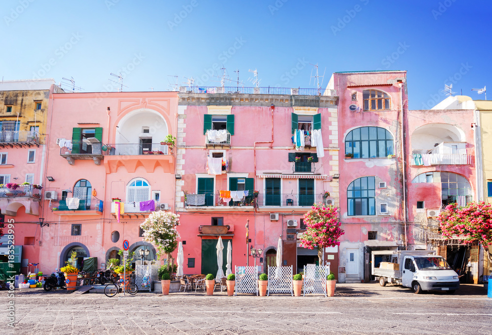Procida island with colorful houses in small town street, Italy, retro toned