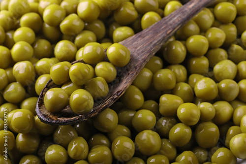 pile of canned green peas