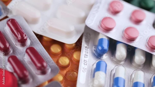 many different tablets in packages, pharmaceutical industry