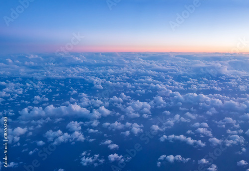 Beautiful sunset panoramic view above clouds