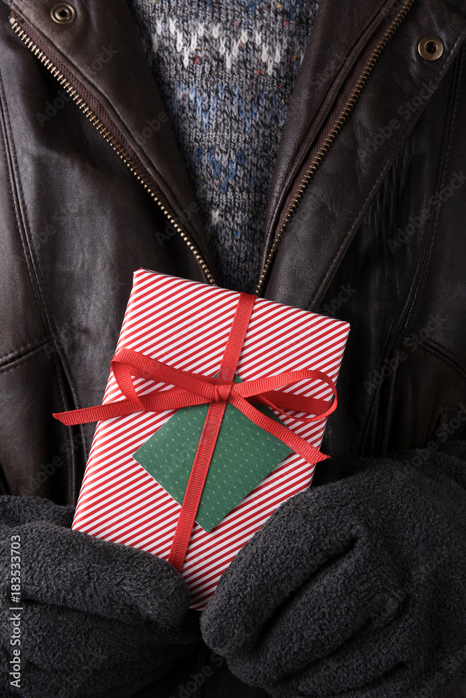 Closeup Man Holding Christmas Present Closeup Man Holding Christmas Present