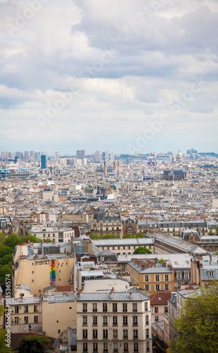 Paris cityscape taken from Montmartre. Cloudy day