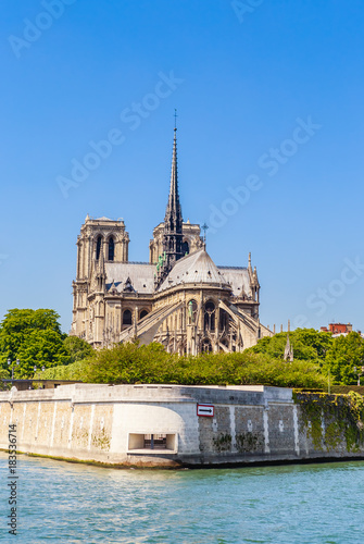 Obraz na płótnie Notre Dame de Paris Catholic Christian Cathedral with the Seine river on a sunny spring day. Paris w salonie