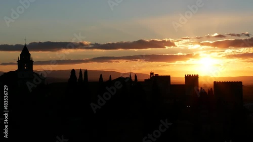 Silhouette of old town and fortress with a break-taking sunset view