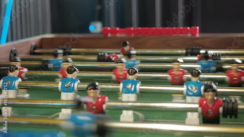 Wallpaper Mural Active people playing foosball. table soccer plaers. Friends play together table football Torontodigital.ca